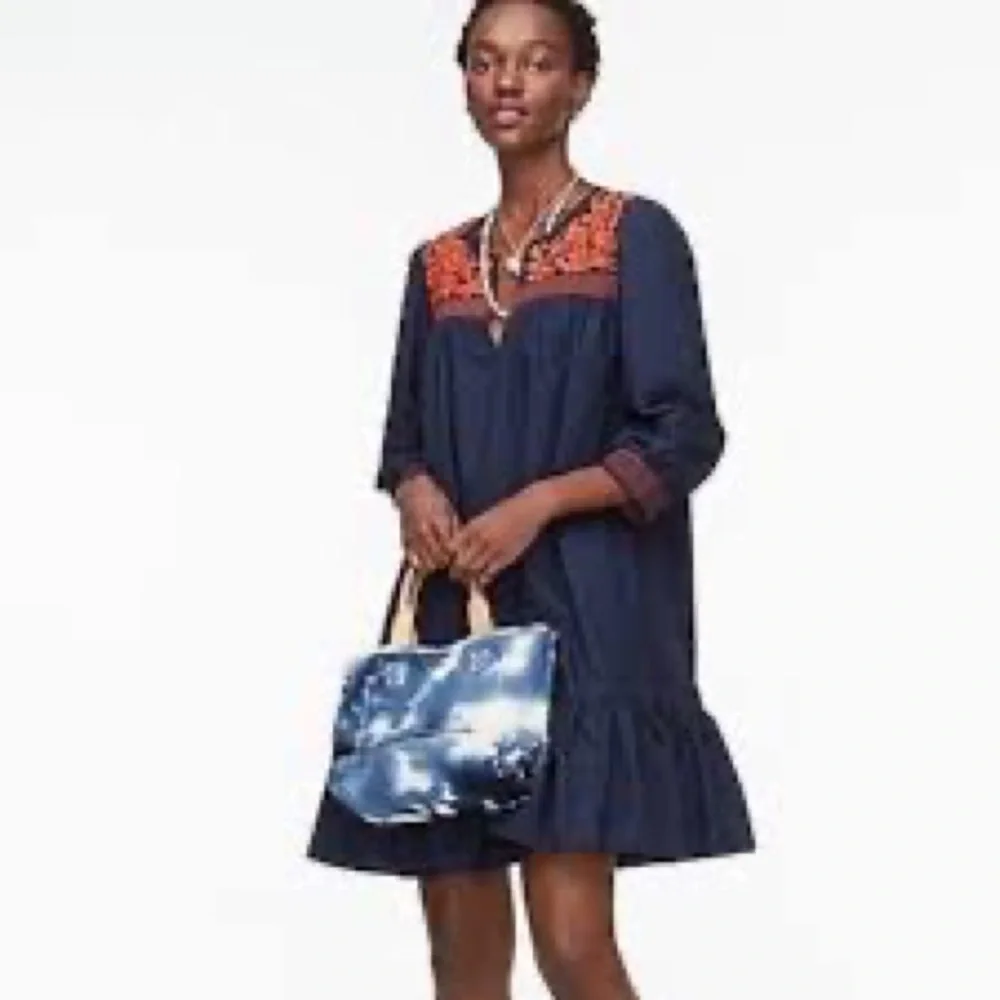 J. Crew adorable, flattering, comfy dress with great pockets. Worn once